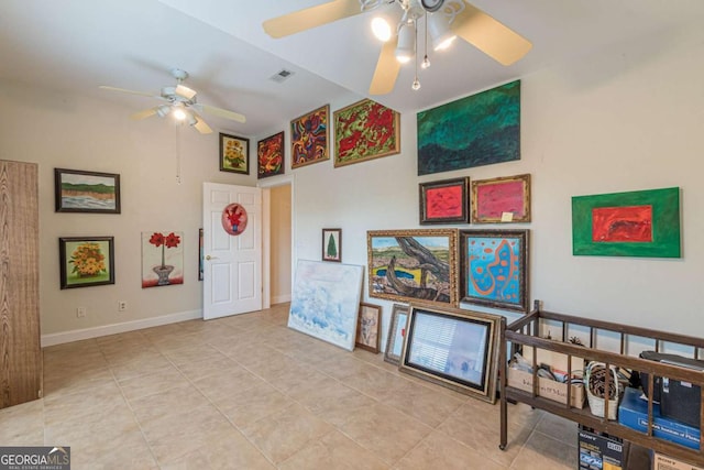 interior space featuring ceiling fan