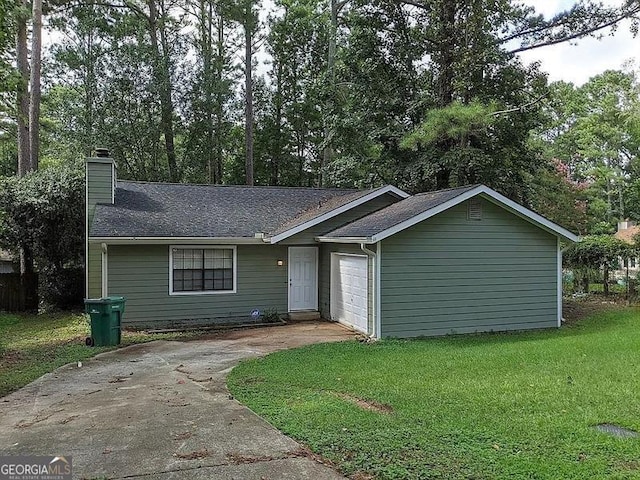 single story home featuring a garage and a front lawn