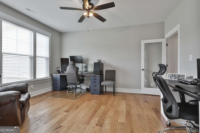 office area featuring ceiling fan and light hardwood / wood-style floors