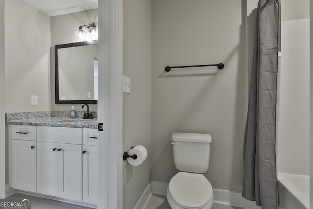 full bathroom with tile patterned flooring, vanity, shower / bath combo, and toilet