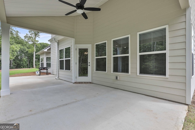 view of patio featuring ceiling fan