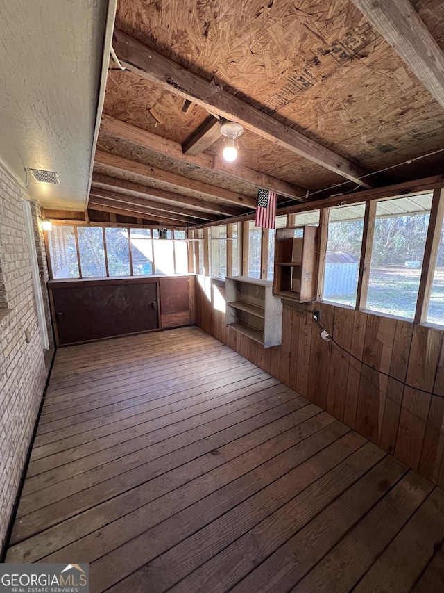 view of unfurnished sunroom