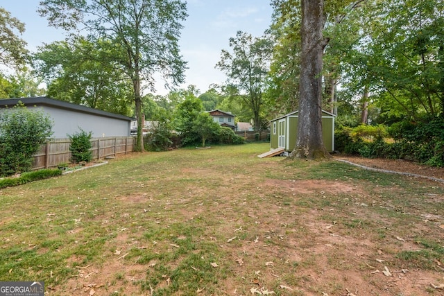 view of yard with a storage shed