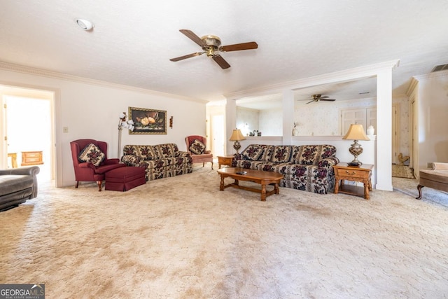 carpeted living room with ceiling fan, a textured ceiling, and ornamental molding