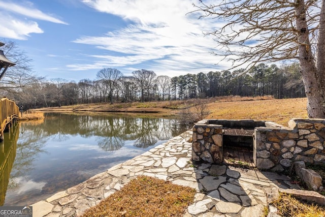 exterior space with a water view