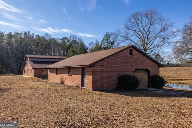 view of property exterior with a garage