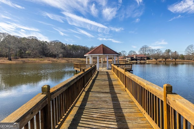 dock area featuring a gazebo and a water view