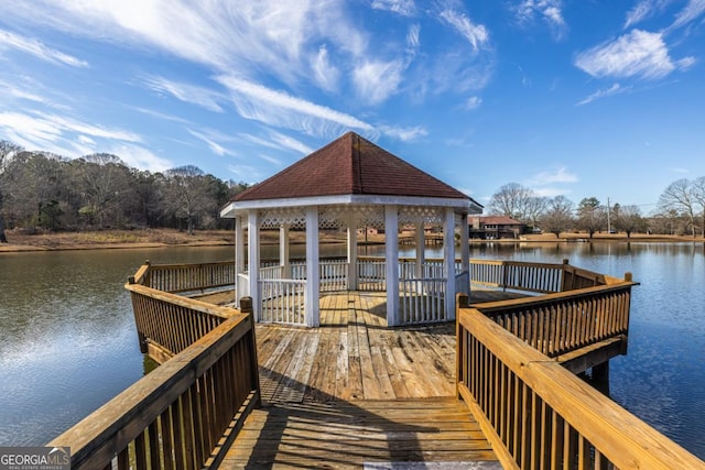 dock area with a gazebo and a water view