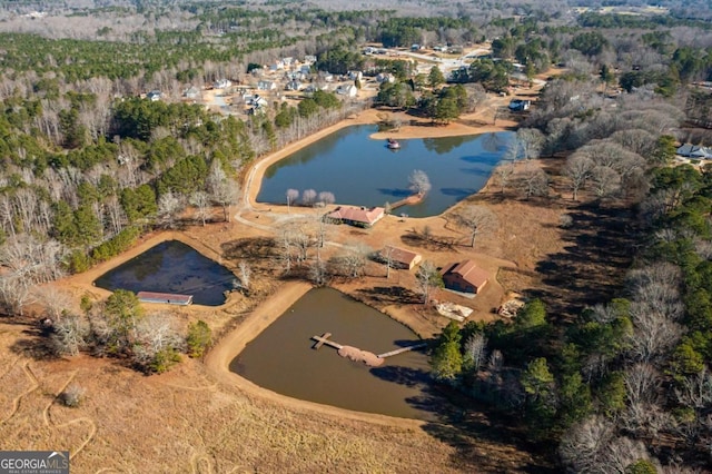 drone / aerial view with a water view