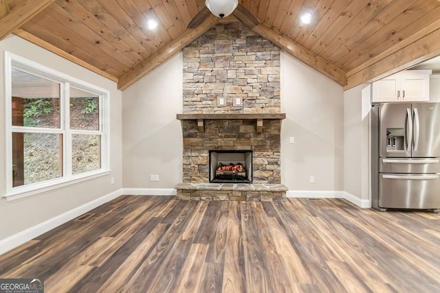 unfurnished living room featuring a stone fireplace, wood ceiling, lofted ceiling, and hardwood / wood-style flooring