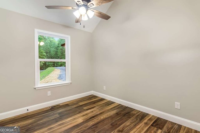 unfurnished room with dark hardwood / wood-style floors, ceiling fan, and lofted ceiling