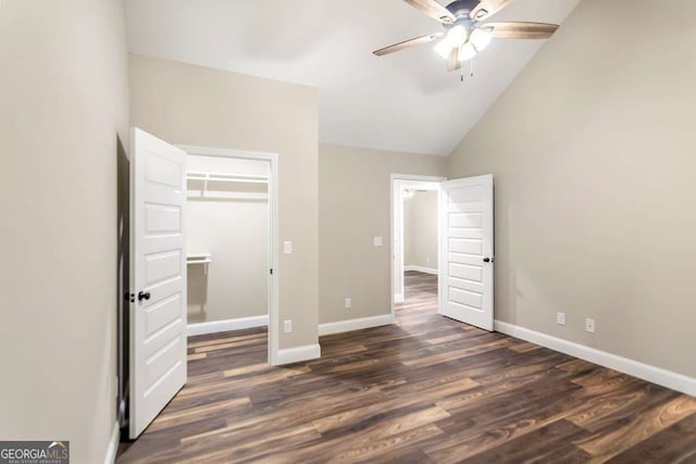 unfurnished bedroom with a closet, dark hardwood / wood-style floors, high vaulted ceiling, and ceiling fan