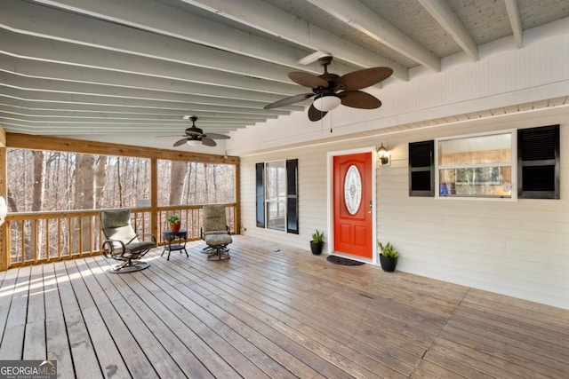 wooden terrace with ceiling fan