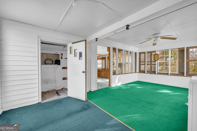 interior space with a wealth of natural light and ceiling fan