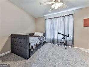 bedroom featuring ceiling fan