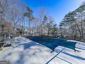 view of snow covered pool