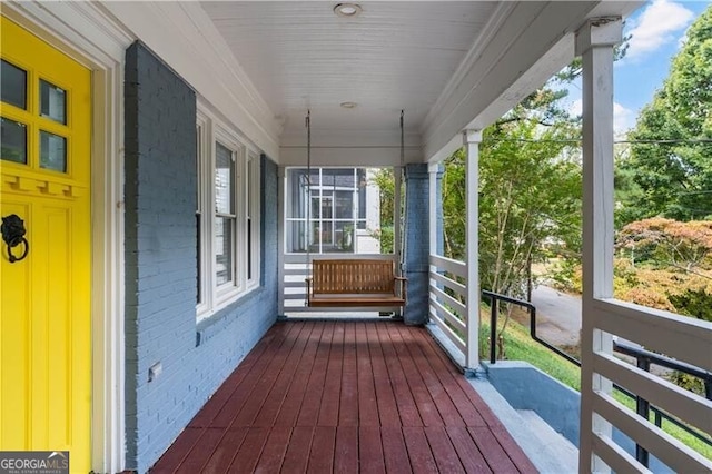 wooden terrace with covered porch