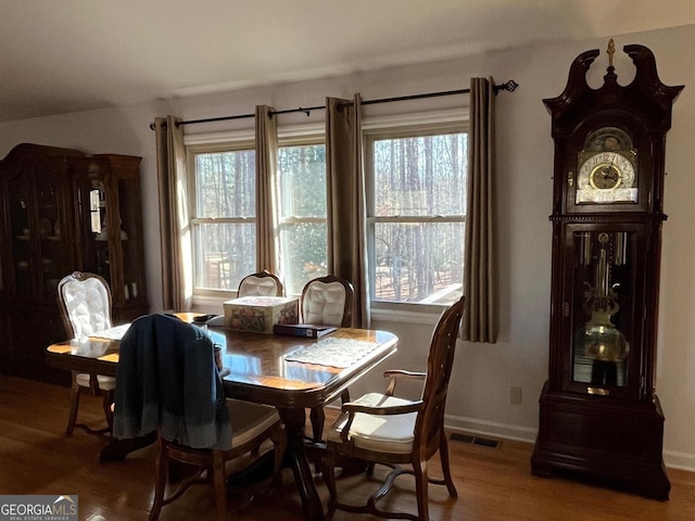 dining room featuring wood-type flooring