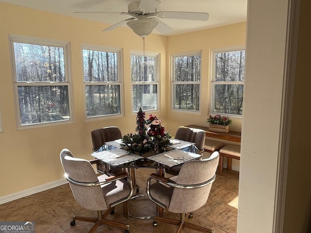 dining area featuring ceiling fan