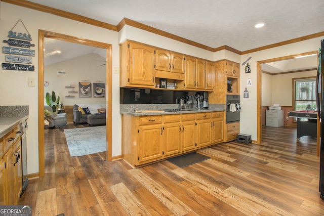 kitchen featuring dark hardwood / wood-style flooring, backsplash, vaulted ceiling, and oven