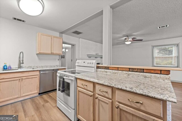 kitchen with light brown cabinets, electric range, stainless steel dishwasher, and sink