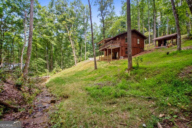 view of yard featuring a deck