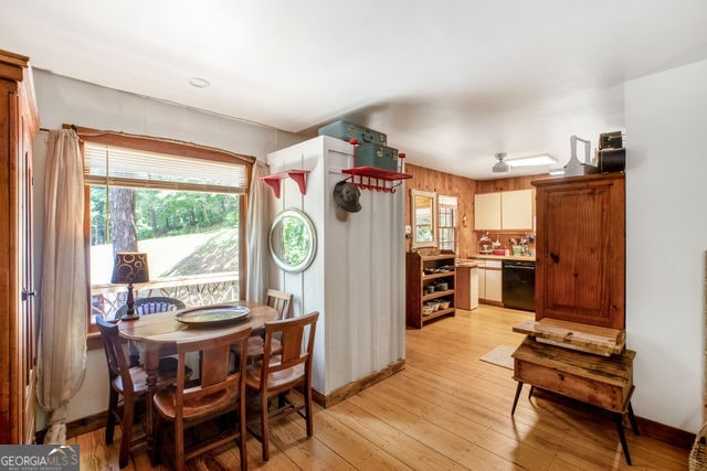 dining area with light wood-type flooring