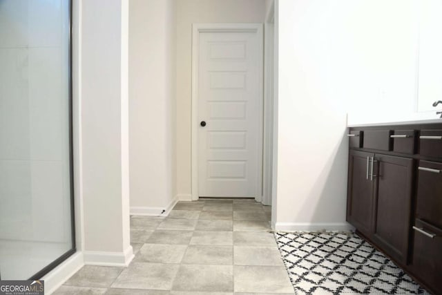 bathroom with vanity and walk in shower