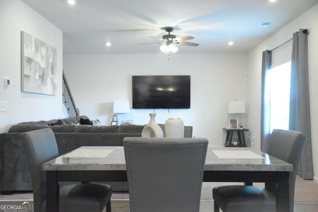 dining space with ceiling fan