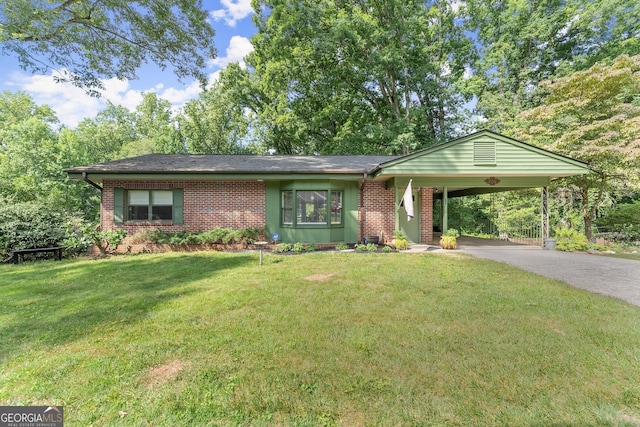 ranch-style home with a front lawn and a carport