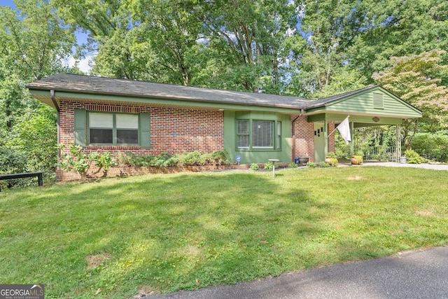 ranch-style home with a front yard