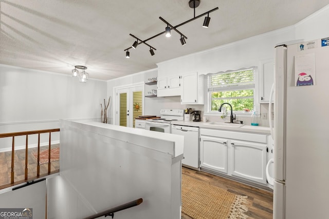 kitchen with dark hardwood / wood-style floors, white cabinetry, white appliances, and sink