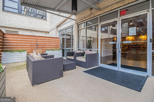 view of patio / terrace featuring an outdoor living space and ceiling fan