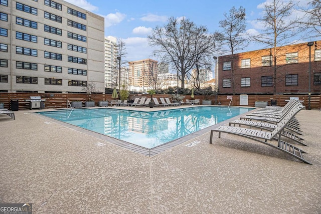 view of pool featuring a patio