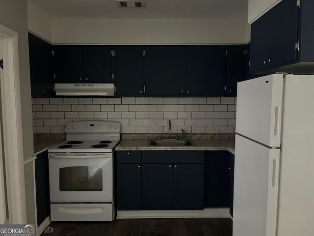 kitchen featuring tasteful backsplash, sink, and white appliances