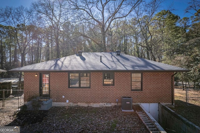 back of house with cooling unit