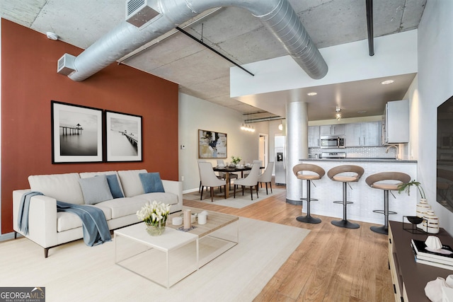 living area featuring light wood-type flooring