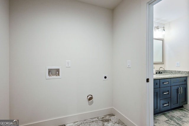 washroom with washer hookup, laundry area, marble finish floor, and hookup for an electric dryer