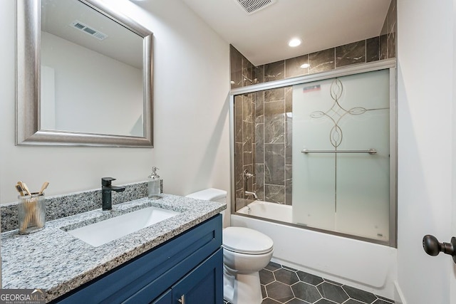 full bathroom with toilet, enclosed tub / shower combo, visible vents, and vanity