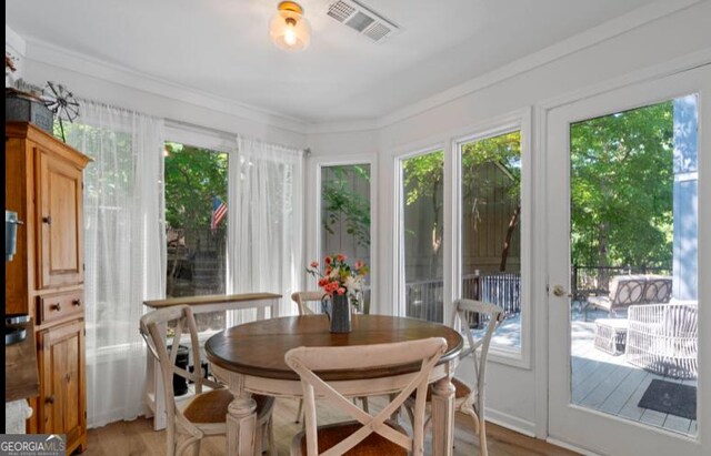 sunroom / solarium with a wealth of natural light