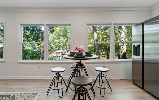 dining space featuring light hardwood / wood-style floors