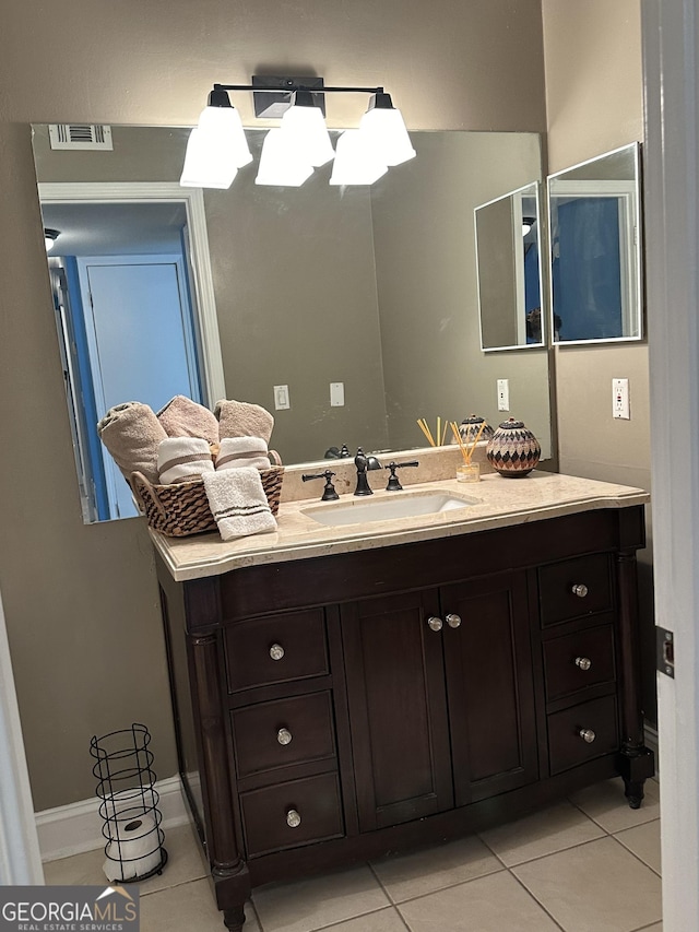 bathroom featuring vanity and tile patterned flooring