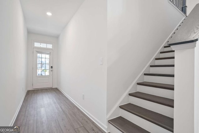 doorway with light hardwood / wood-style flooring