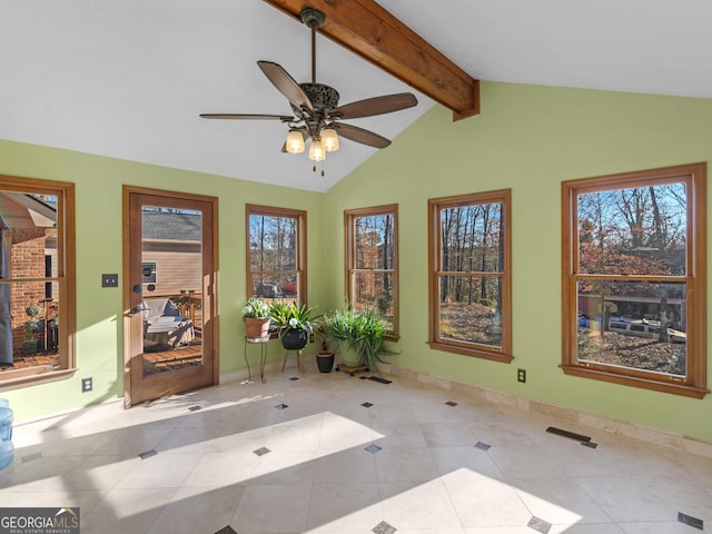 interior space featuring lofted ceiling with beams, ceiling fan, and light tile patterned flooring