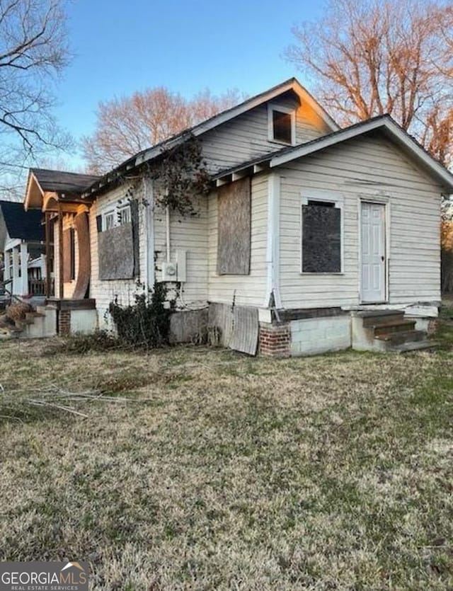 exterior space with a lawn