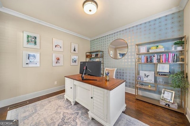 home office with ornamental molding and dark wood-type flooring