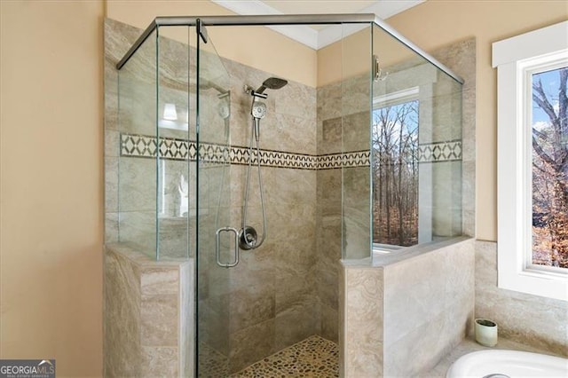 bathroom featuring separate shower and tub