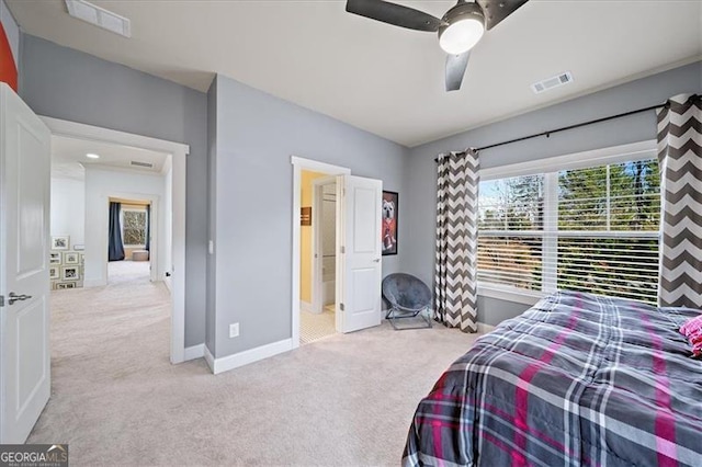 bedroom with light colored carpet and ceiling fan