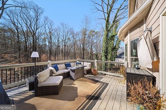 wooden deck with an outdoor hangout area