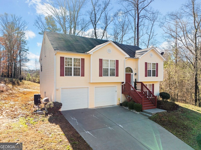 split foyer home featuring a garage